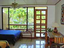 Room at affordable Bed & Breakfast in rainforest with lakeview on Lake Arenal Costa Rica near La Fortuna Volcano in Nuevo Arenal Best breakfast best price. Gay Friendly View Casita bungalow Best Hotel